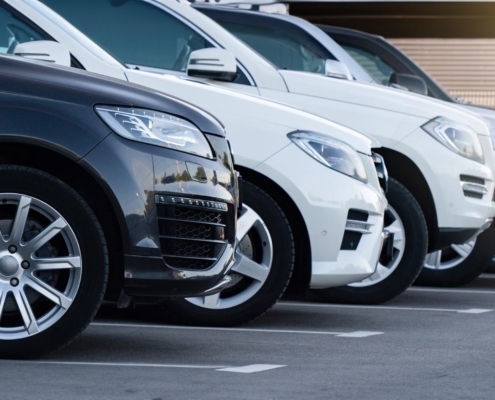 Side view of a row of parked cars