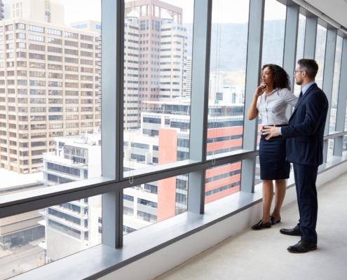 Business owner walking through commercial office space