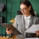 Businesss person looking over insurance papers