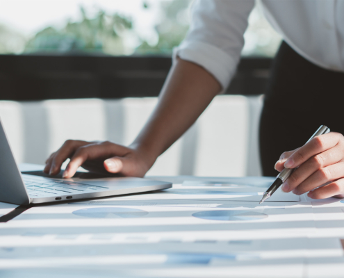 Close up of accountant or banker checking investment results