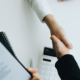 Real Estate Agents are shaking hands with customers