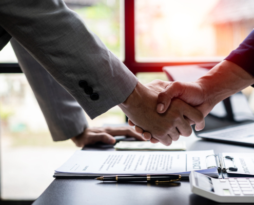 Successful handshake and agreement Real estate agent and client